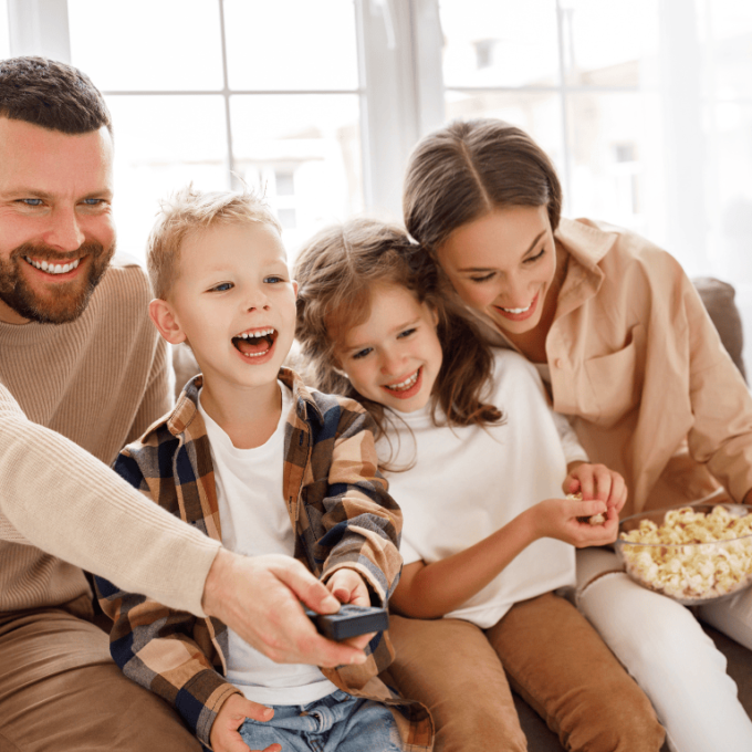 a family photo showing parents with two children