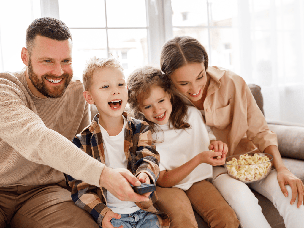 a family photo showing parents with two children