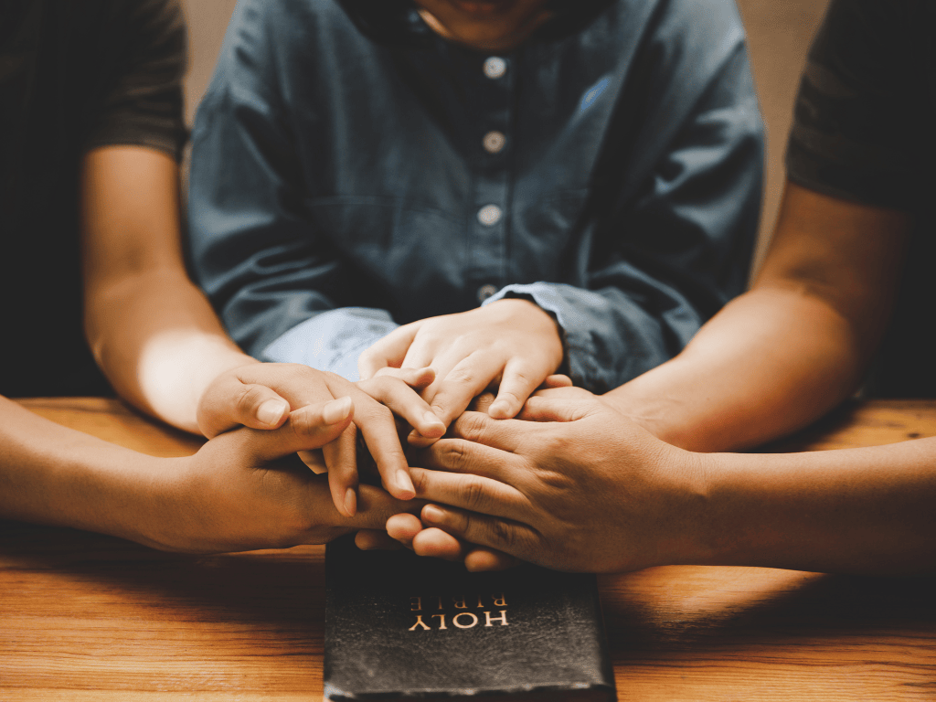 family holding hands together