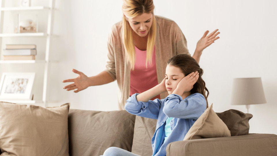 girl not listening hands over ears